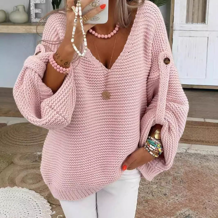 Women loose knit sweater with V-neck, balloon sleeves and button detail Mune Fashion