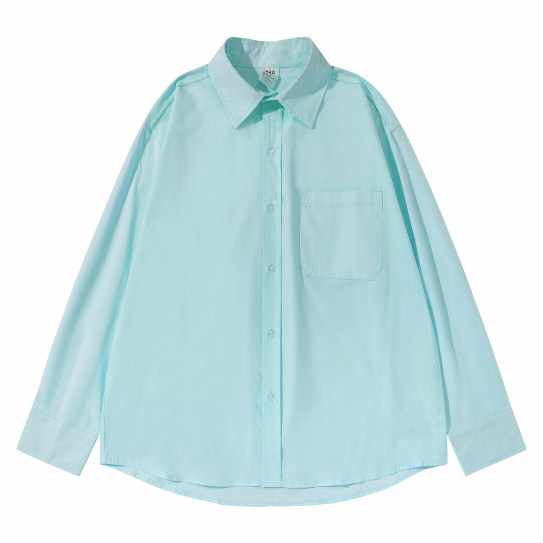 Unisex Boxy shirt with Kent collar, applied breast pocket and relaxed fit Mune Fashion