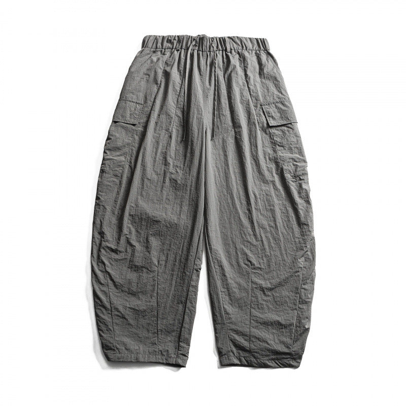 Unisex Wide Cropped Cargo Pants with Elastic Waistband, Drawstring and Overlay Pockets Mune Fashion