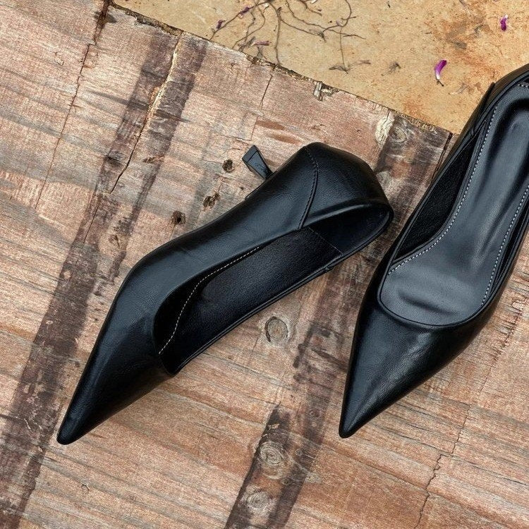 Women's minimalist pointed toe leather look pumps with ergonomic low heel Mune Fashion