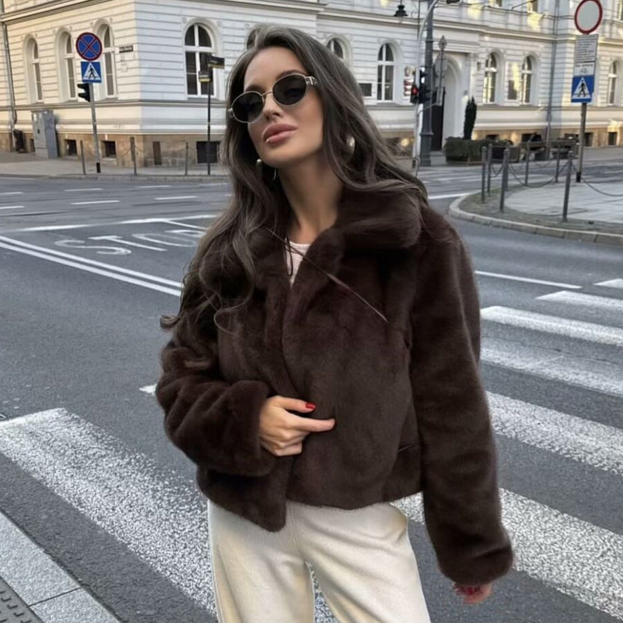 Women's short-cut vegan faux fur jacket with wide lapel collar and concealed snap-button placket Mune Fashion