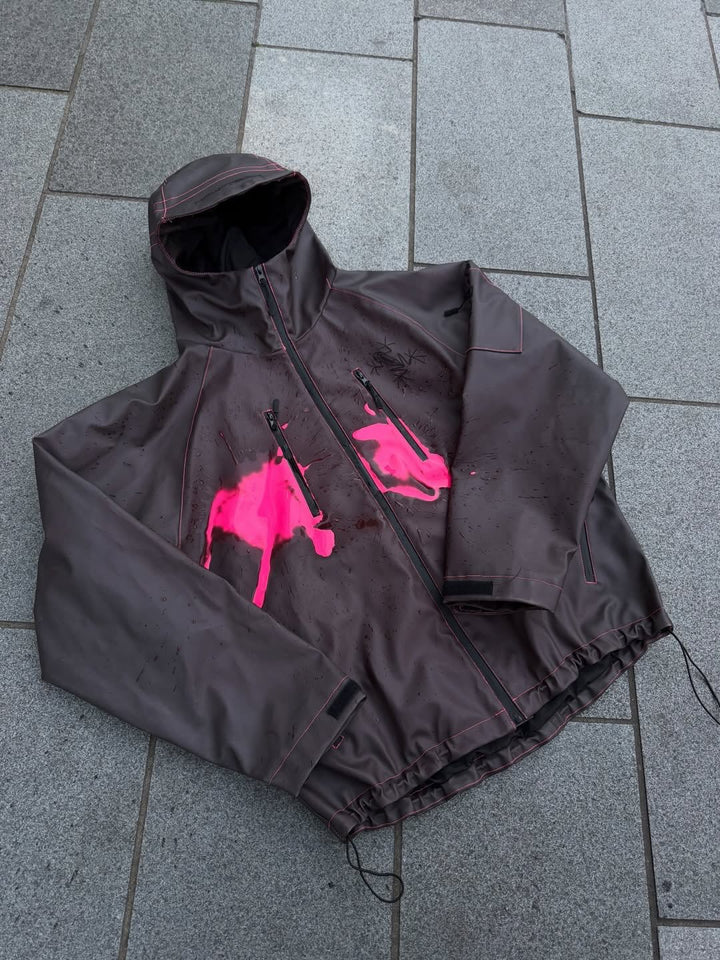 Women's nan waterproof hoodie jacket with splash print design, vertical zippered pockets, and adjustable hem Mune Fashion