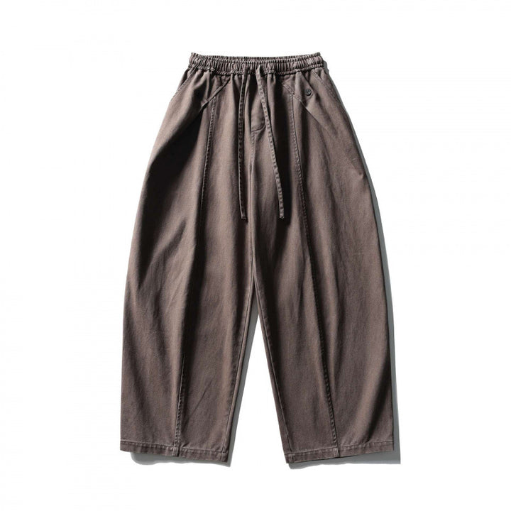 Unisex wide balloon pants made of cotton blend with drawstring waistband and decorative darts Mune Fashion