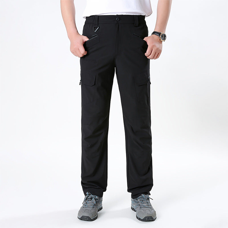 Men's nano technical trekking pants with elastic waistband, pre-shaped knees, and multiple cargo and zip pockets.