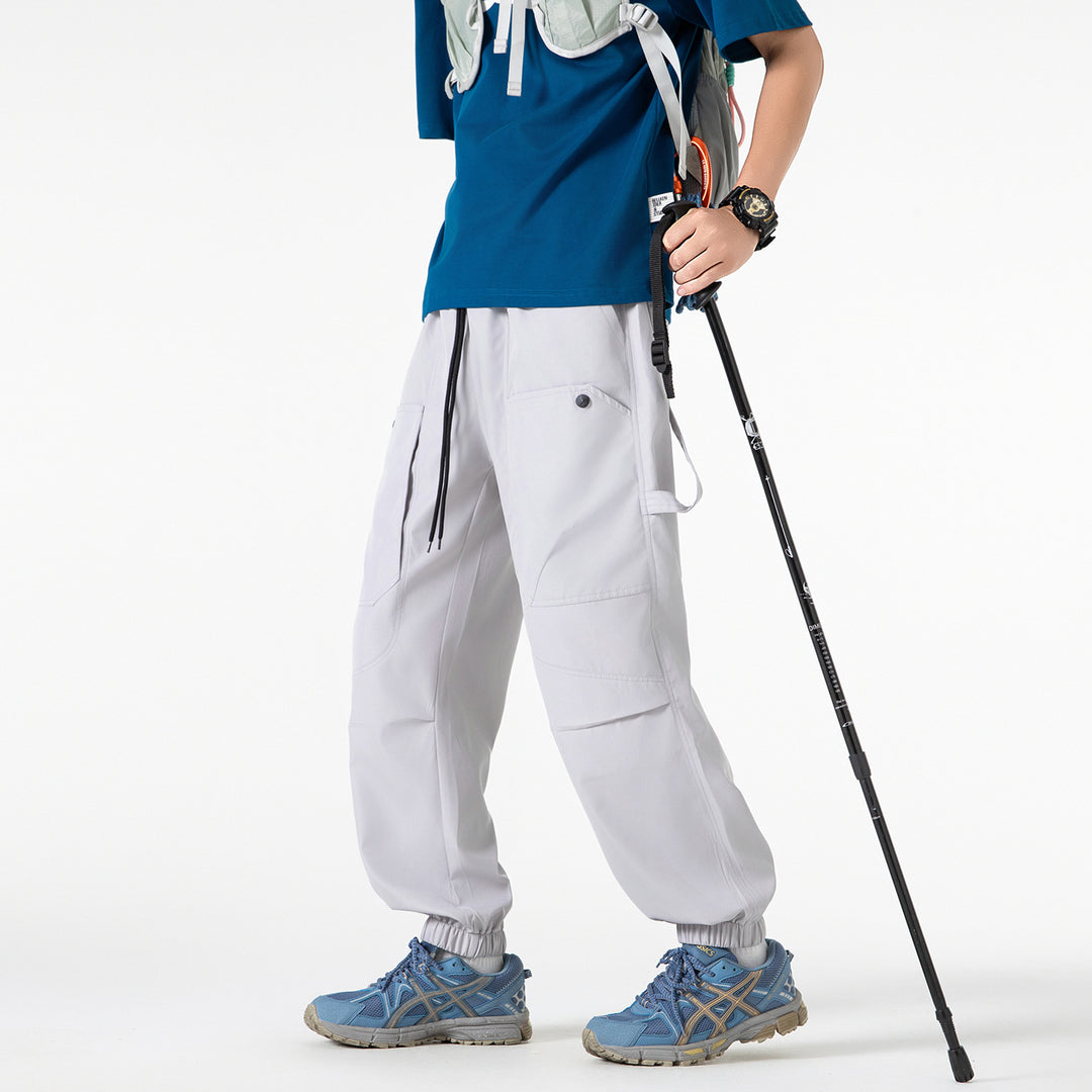 Men's utility cargo jogger pants with elastic waistband and oversized flap pockets