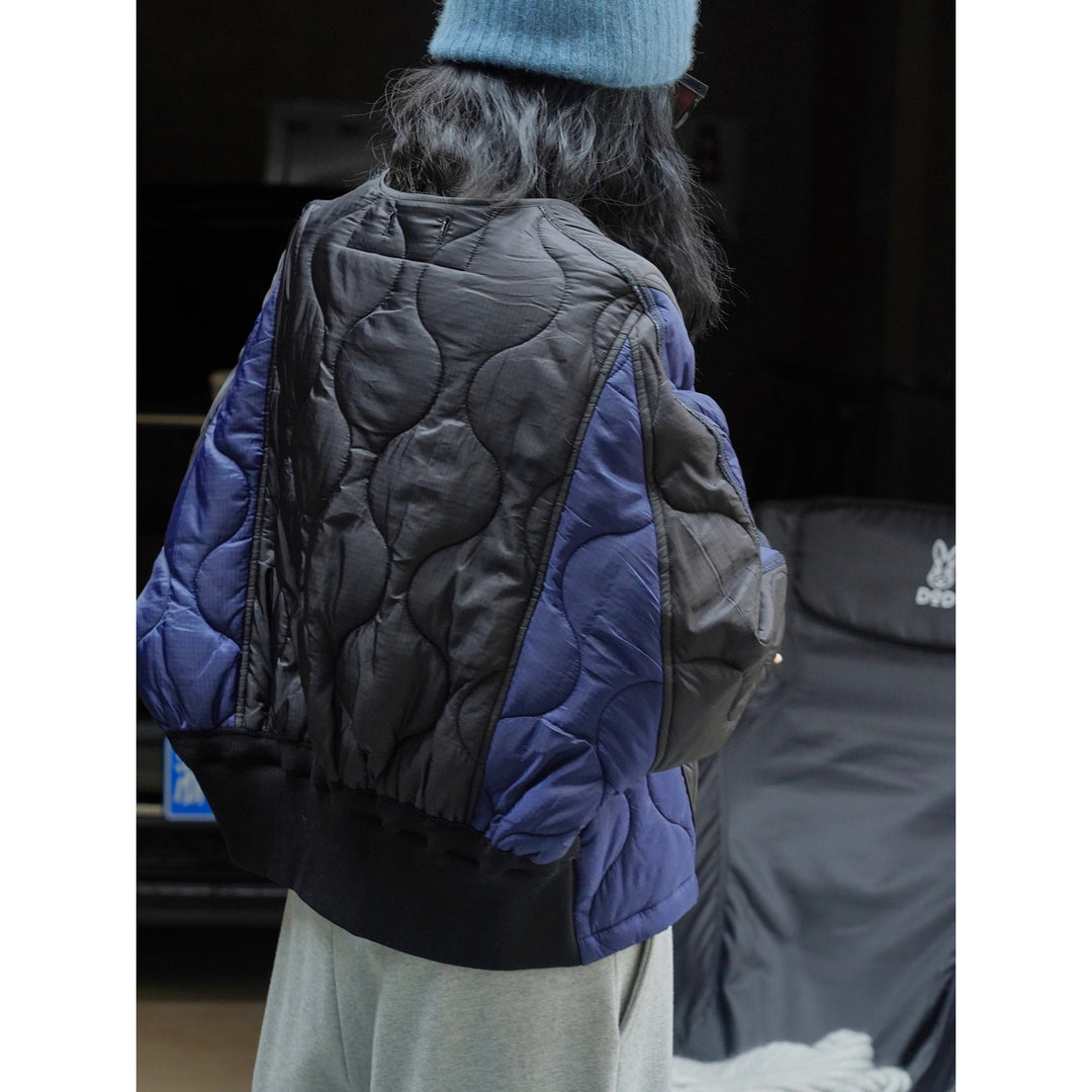 Women's Padded Oversized Quilted Jacket with Contrasting Sleeves and Button Placket Mune Fashion