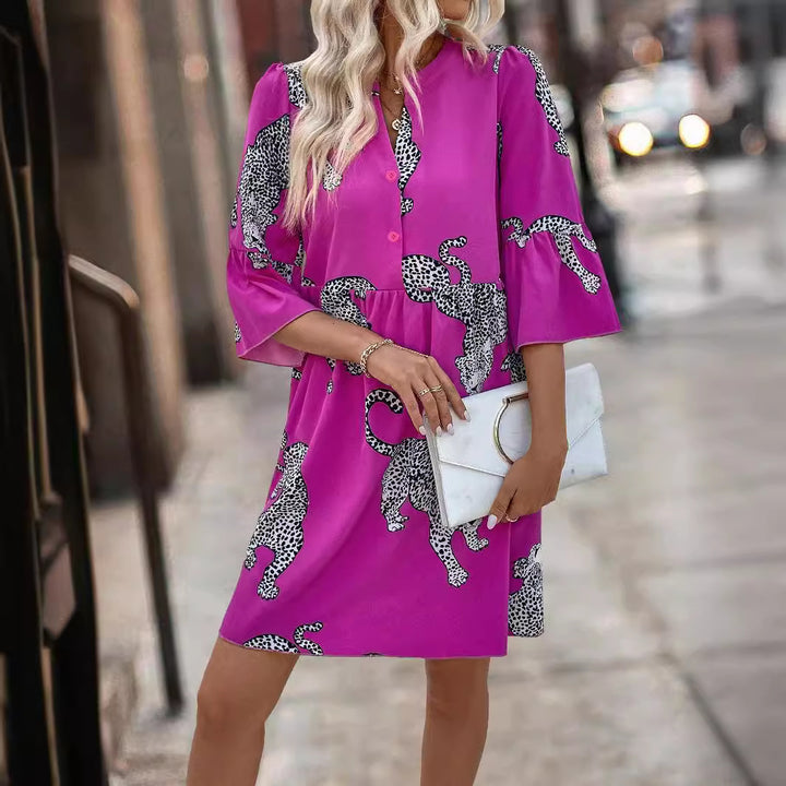 Women's casual tunic dress with gathered waist seam, button placket, and graphic animal silhouette print Mune Fashion