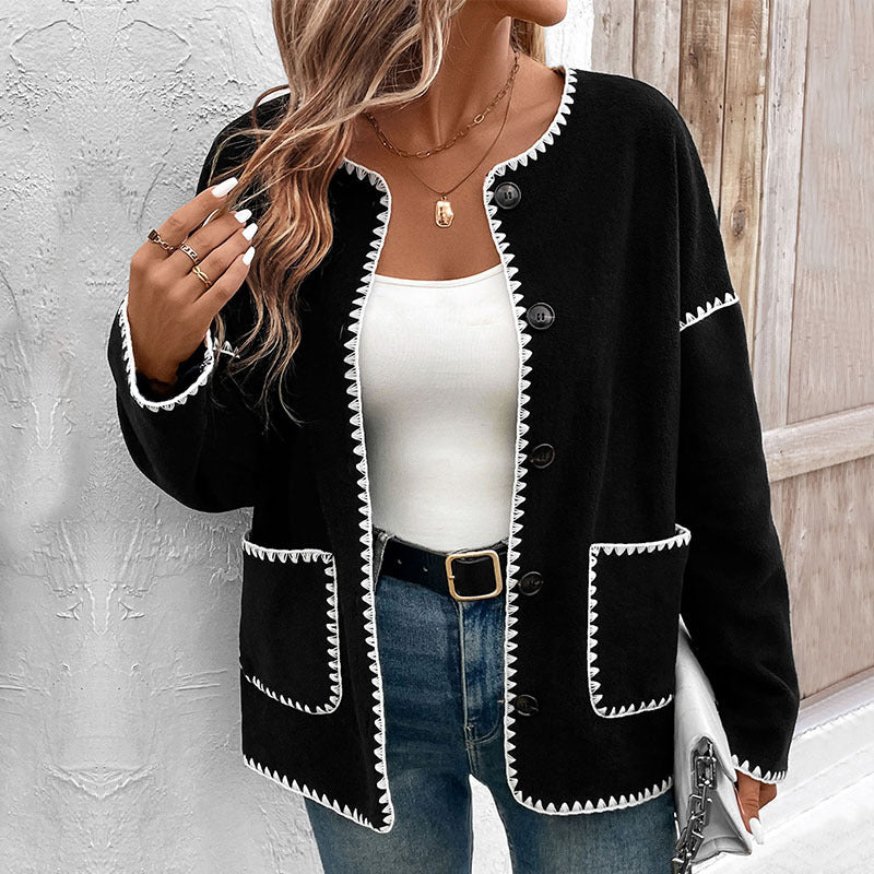 Women's oversized cardigan with contrasting decorative seams, patch pockets and button placket Mune Fashion