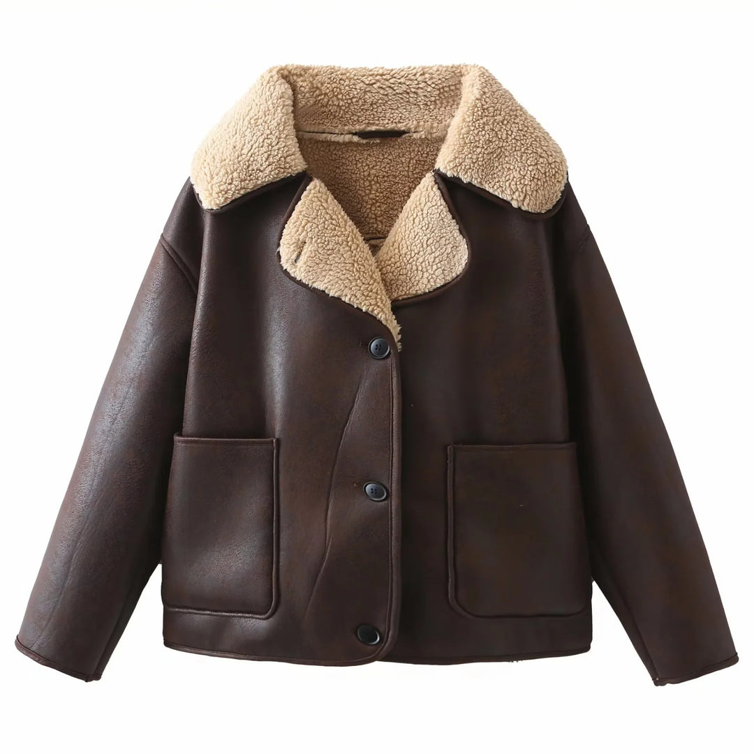 Women's trendy faux leather shearling jacket with large teddy collar, patch front pockets, and button closure Mune Fashion