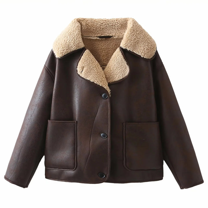Women's trendy faux leather shearling jacket with large teddy collar, patch front pockets, and button closure Mune Fashion