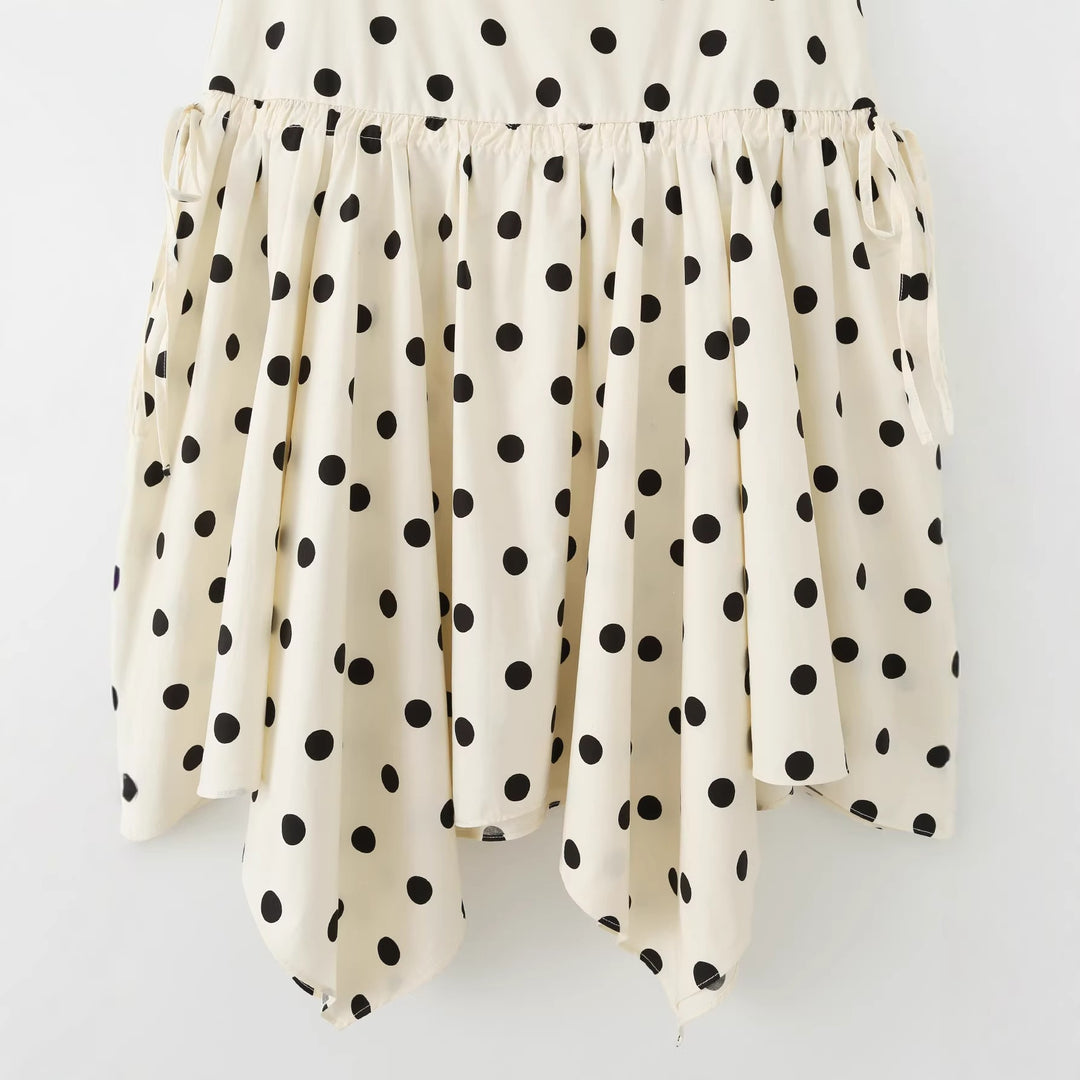 Women's midi skirt with asymmetrical jagged hem, polka dot pattern and high waistband Mune Fashion