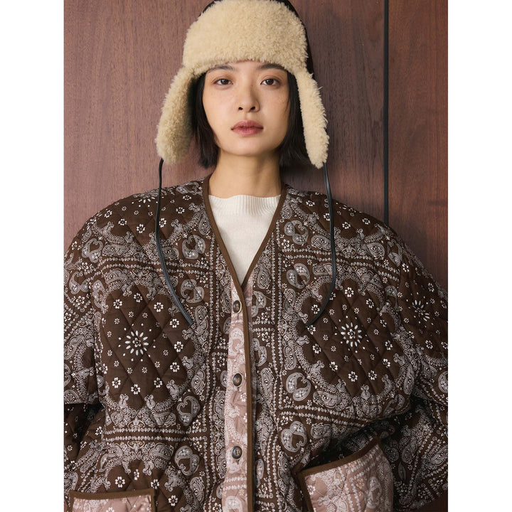 Women's quilted jacket with bandana print, oversized silhouette and patch pockets Mune Fashion