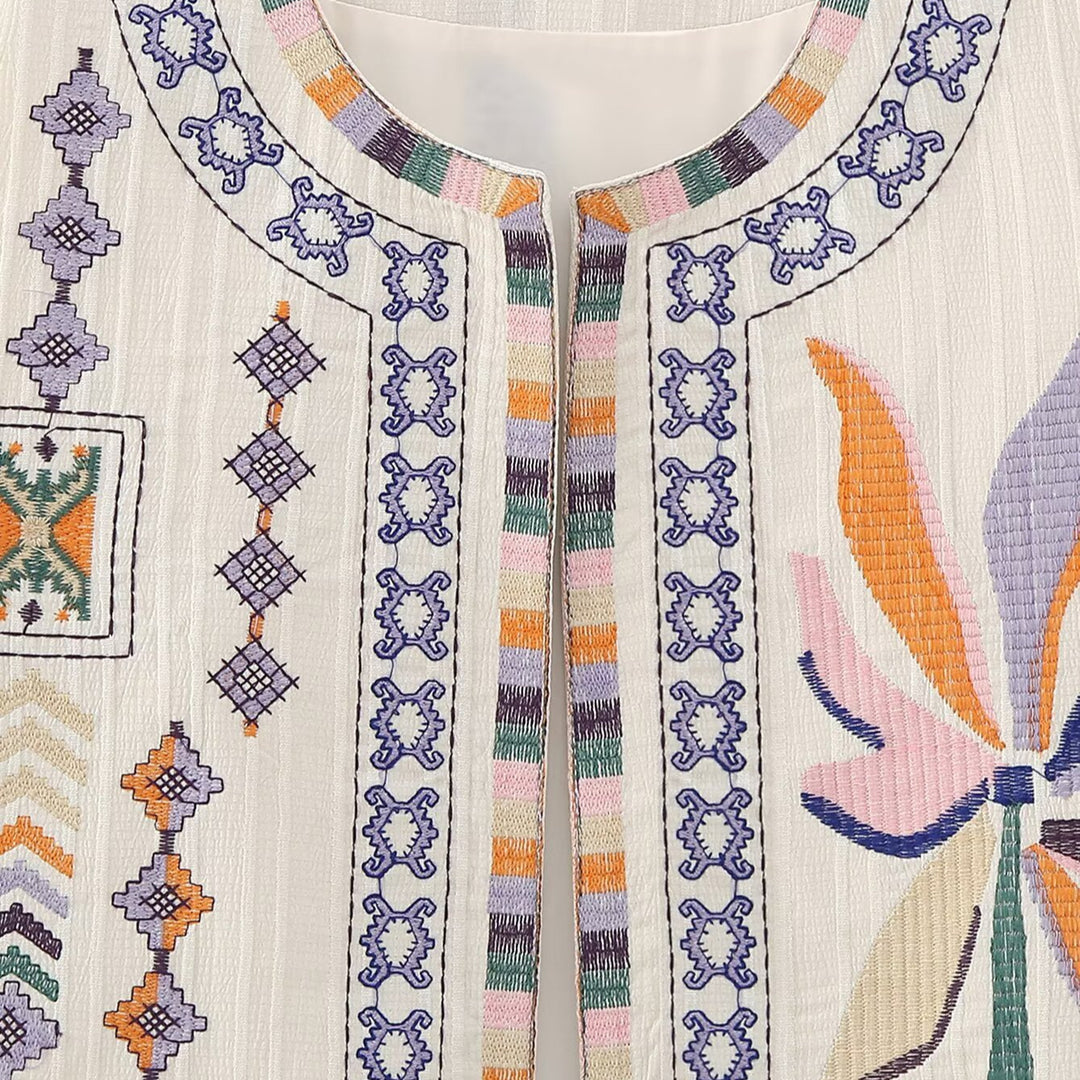 Ladies embroidered sleeveless Boho vest with folkloric motifs and open front Mune Fashion