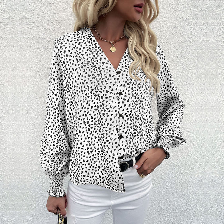 Women's lightweight blouse with V-neck, continuous button placket, and ruffled cuffs Mune Fashion