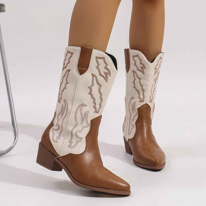 Women's cowgirl boots in western style with mid-high block heel, pointed toe cap, and decorative embroidery Mune Fashion