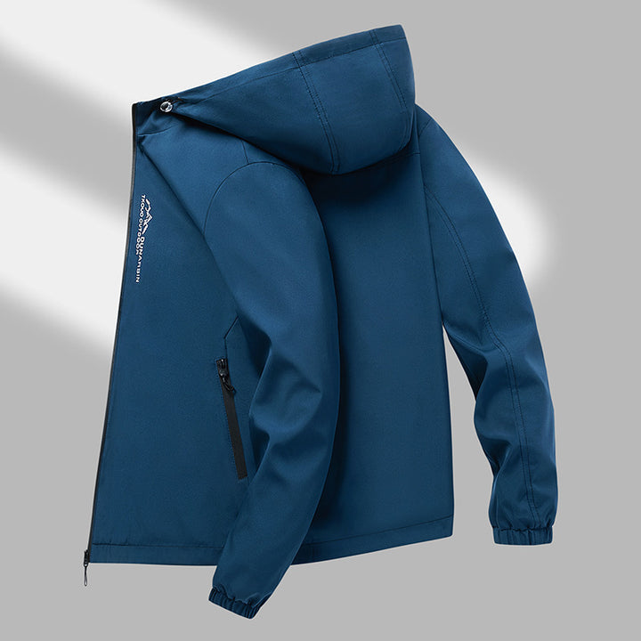 Men's windproof softshell jacket with adjustable hood, water-repellent membrane, and secure zip pockets Mune Fashion