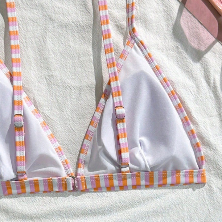 Women's triangle bikini set with floral pattern and playful design Mune Fashion