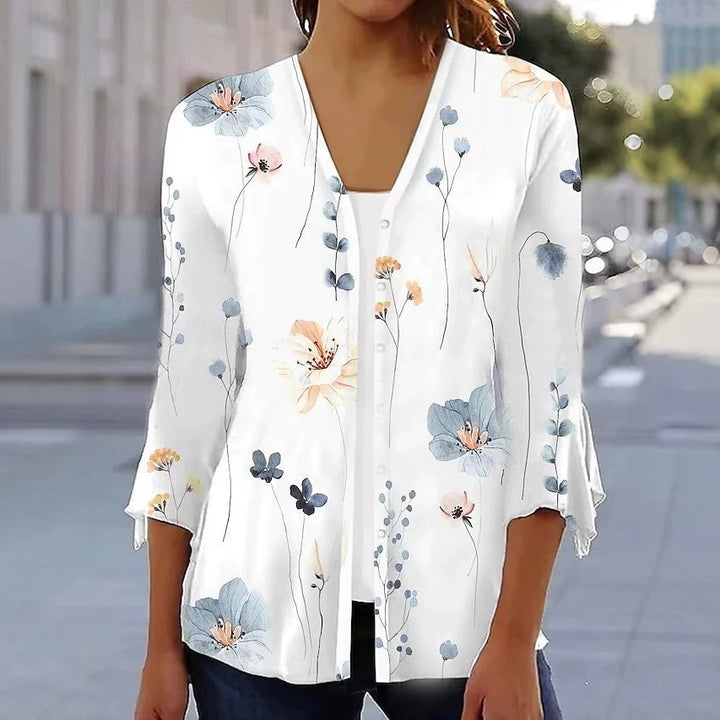 Women's light chiffon blouse with watercolor flower print, V-neck, button placket and three-quarter sleeves Mune Fashion