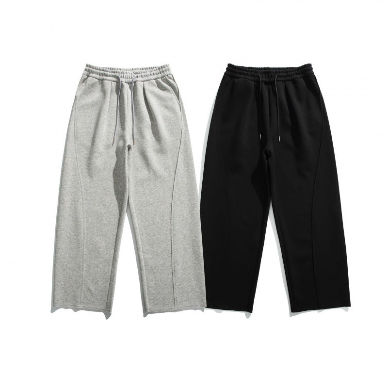 Unisex Loose Cotton Fleece Jogging Pants with Drawstring, Decorative Front Seams and Raw Hem Mune Fashion