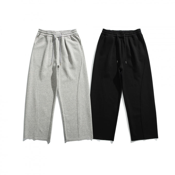 Unisex Loose Cotton Fleece Jogging Pants with Drawstring, Decorative Front Seams and Raw Hem Mune Fashion