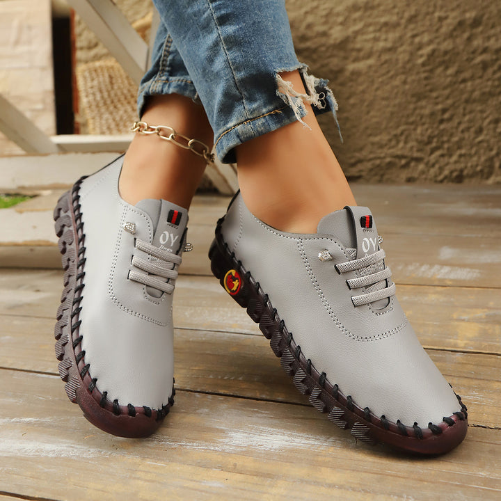 Women's Comfortable Leather-Look Slippers with Flexible Profile Sole and Moccasin Stitch