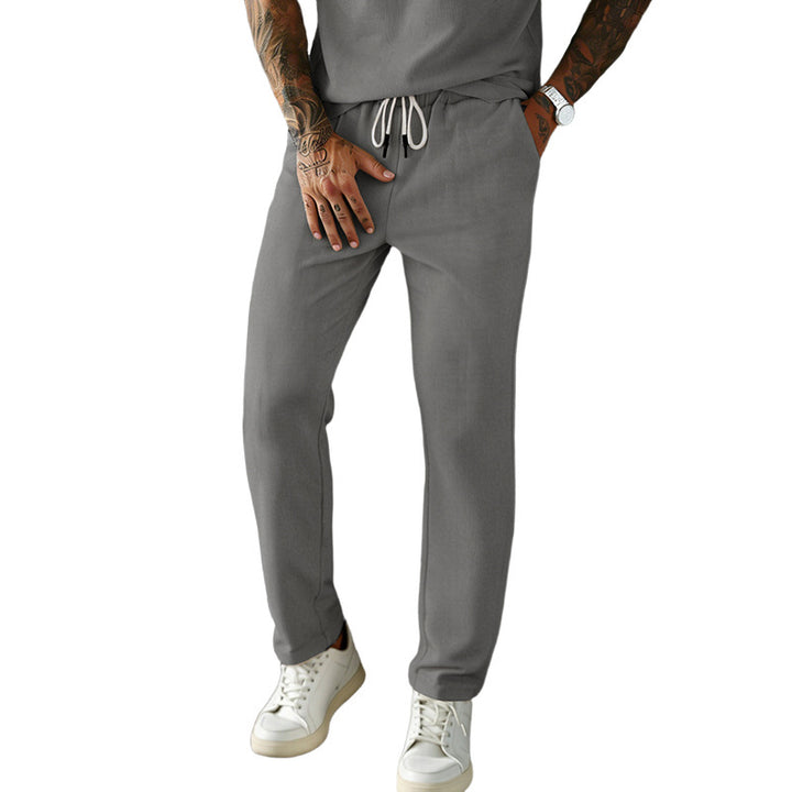 Men's narrow-cut comfort pants with elastic waistband, drawstring, and fine ribbed structure Mune Fashion