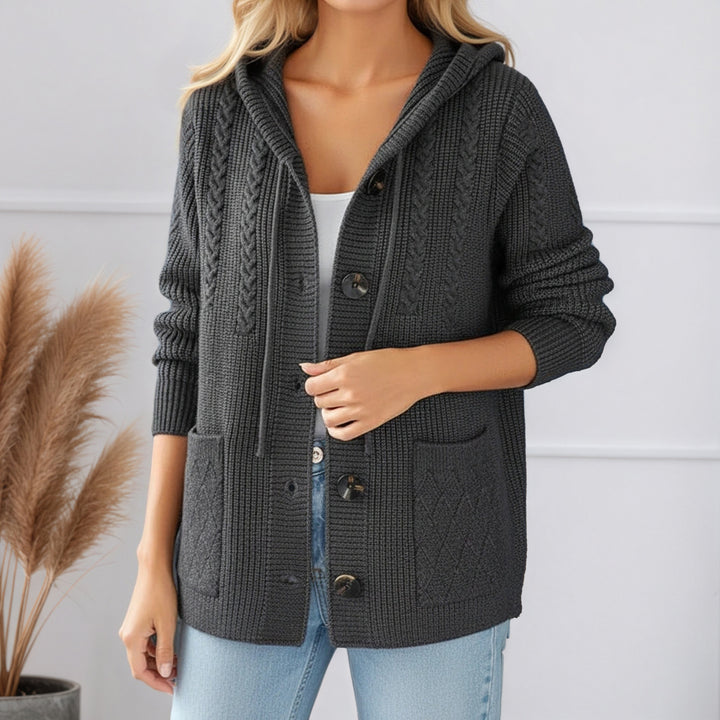 Women's knitted hooded cardigan with ribbed pattern, large wooden buttons, and patch pockets Mune Fashion