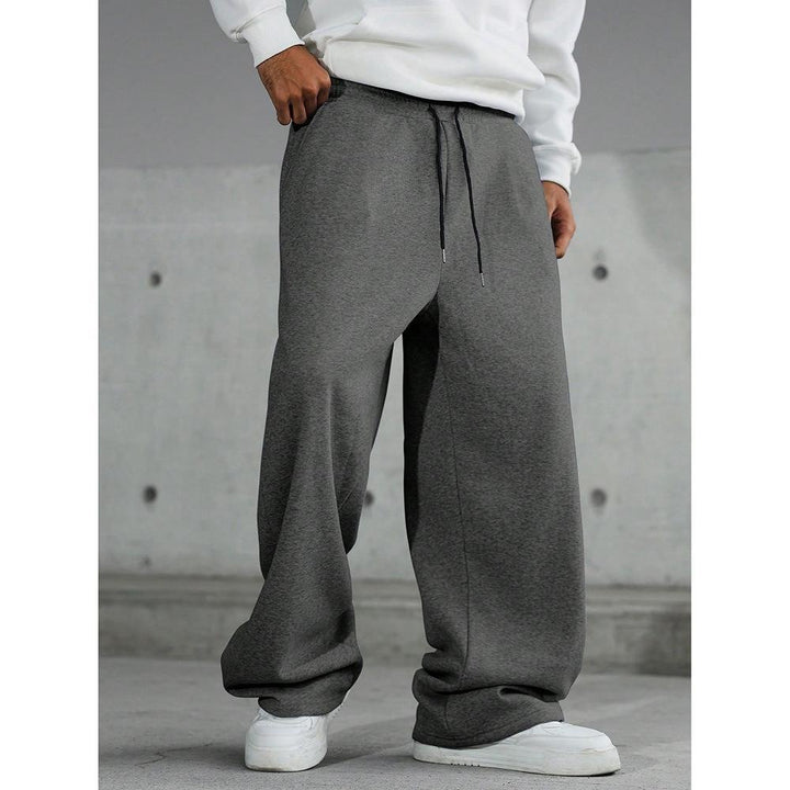 Men's wide Relax fleece pants with a deep crotch, elastic drawstring waistband, and casual side pockets Mune Fashion
