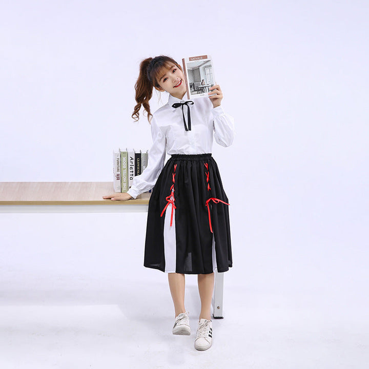 Girls Elegant Blouse with Ruffled Skirt and Bow Details Mune Fashion