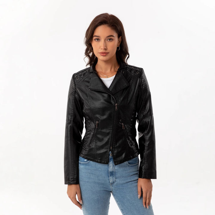 Ladies tailored faux leather biker jacket with quilted shoulder section, asymmetrical zipper and decorative eyelets Mune Fashion