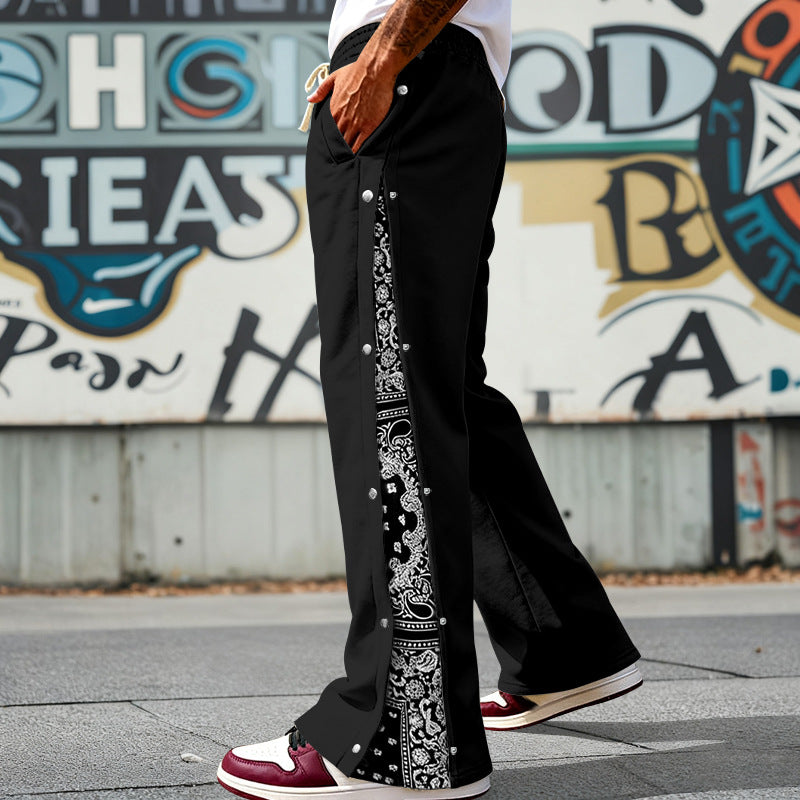 Men's loosely cut snap-front jogging pants with paisley side insert and elastic comfort waistband Mune Fashion
