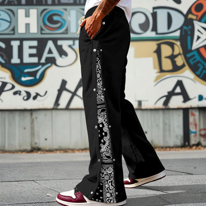 Men's loosely cut snap-front jogging pants with paisley side insert and elastic comfort waistband Mune Fashion