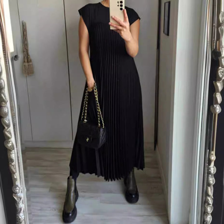 Women's flowing pleated maxi dress with dropped shoulders and side pockets Mune Fashion