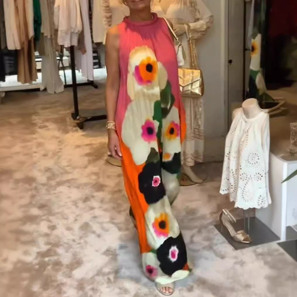 Women's sleeveless maxi dress with ruffled high collar, wide palazzo cut, and large floral print Mune Fashion