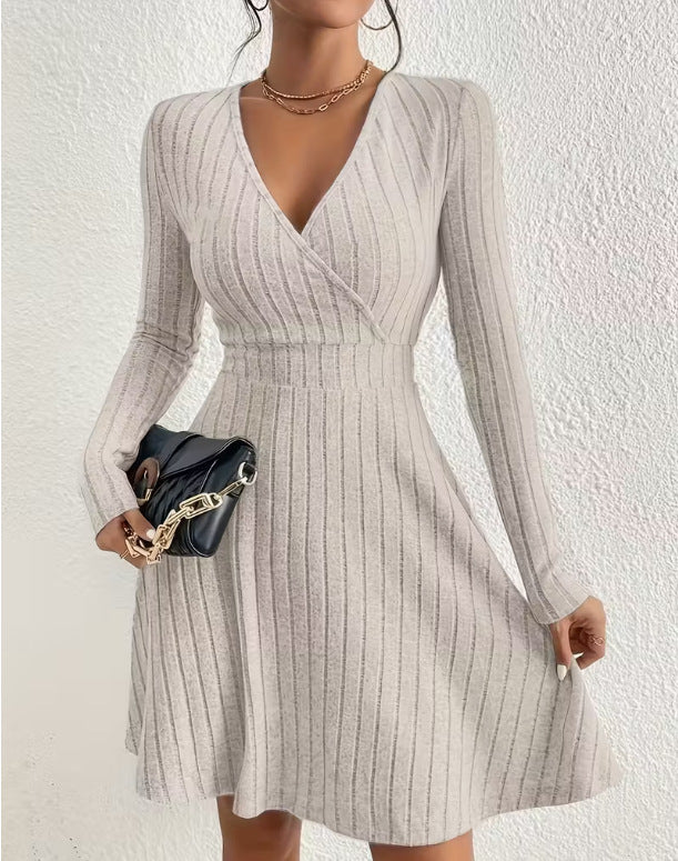 Women's knitted dress with wrap V-neck, tailored waist and flared A-line skirt Mune Fashion