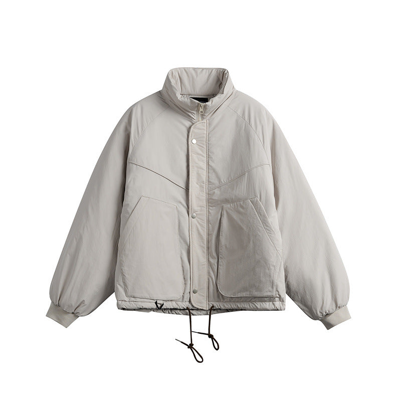 Unisex Short cut boxy padded jacket with drawstring and raglan sleeves Mune Fashion