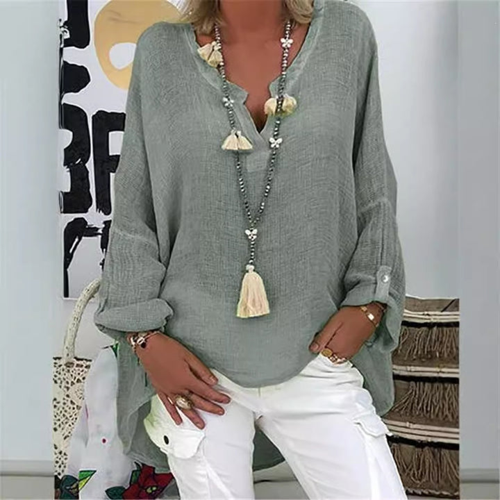 Ladies' nano structured cotton tunic in a loose fit with V-neck, rolled sleeves, and extended back hem Mune Fashion