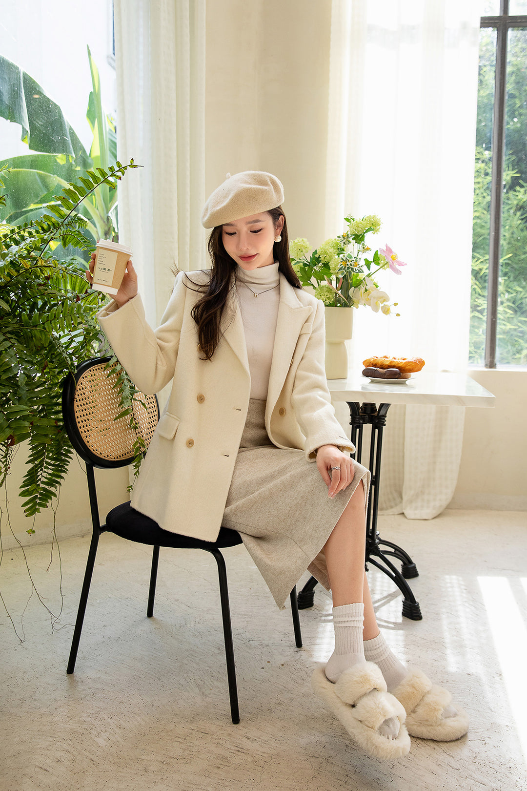 Women's double-breasted wool coat with lapel collar and feminine tailoring Mune Fashion