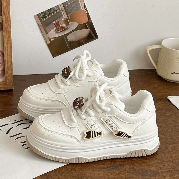 Women's platform sneaker with decorative fish charms and padded comfort insole Mune Fashion