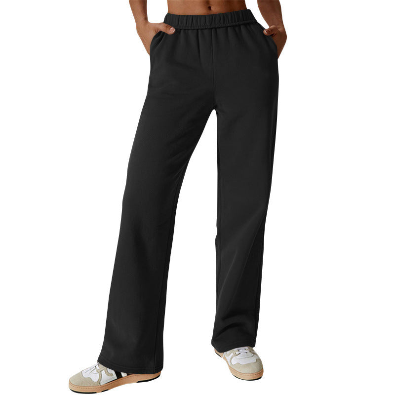 Women high-waisted flared lounge pants with elastic comfort waistband and concealed pockets Mune Fashion
