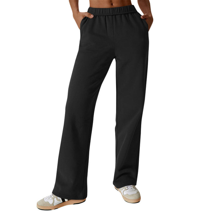 Women high-waisted flared lounge pants with elastic comfort waistband and concealed pockets Mune Fashion