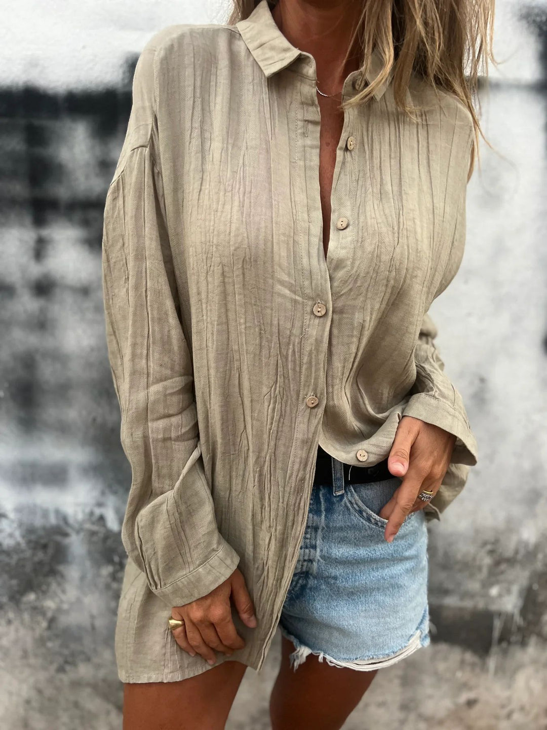 Women's casual oversized tunic shirt with linen texture, wood button placket, and elongated hem Mune Fashion