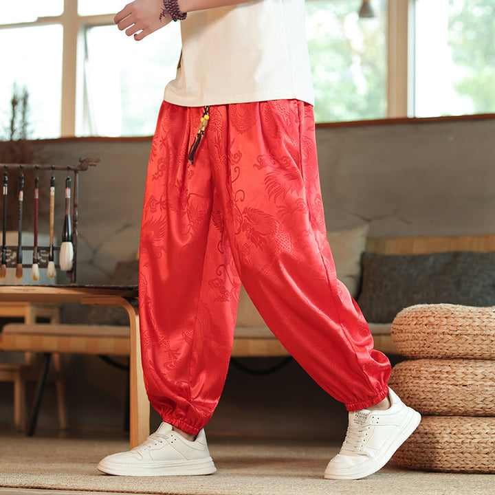 Men's wide Jacquard satin harem pants with drawstring, elastic cuffs, and traditional dragon motif Mune Fashion