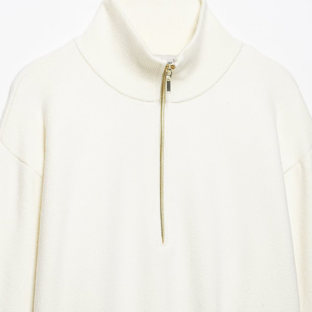Women's chunky knit pullover with half zipper, stand collar and dropped shoulders Mune Fashion