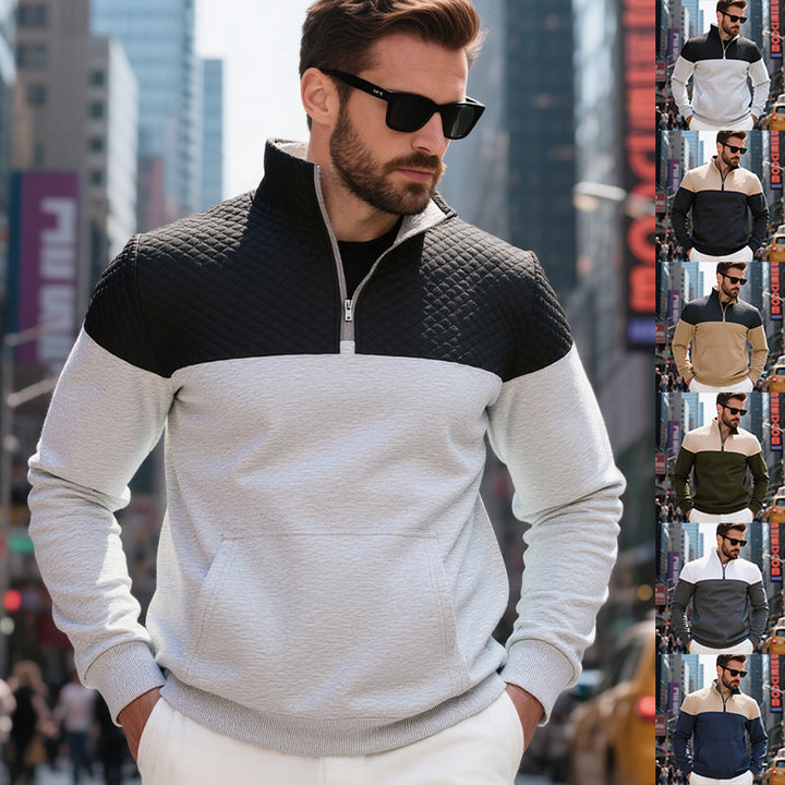 Men's color block half zip sweatshirt with quilted chest area, kangaroo pocket, and elastic cuffs Mune Fashion
