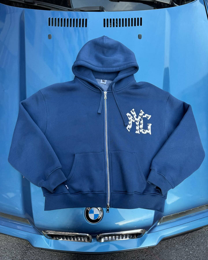 Unisex oversized hooded sweatshirt jacket with two-way zipper and logo application Mune Fashion