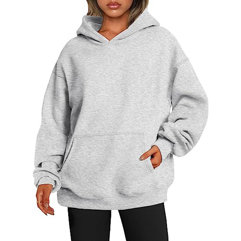 Women's oversized hooded sweatshirt made of soft cotton blend with kangaroo pocket Mune Fashion