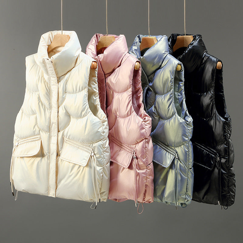 Women's quilted gilet with high stand-up collar, padded, two flap pockets and adjustable hem Mune Fashion