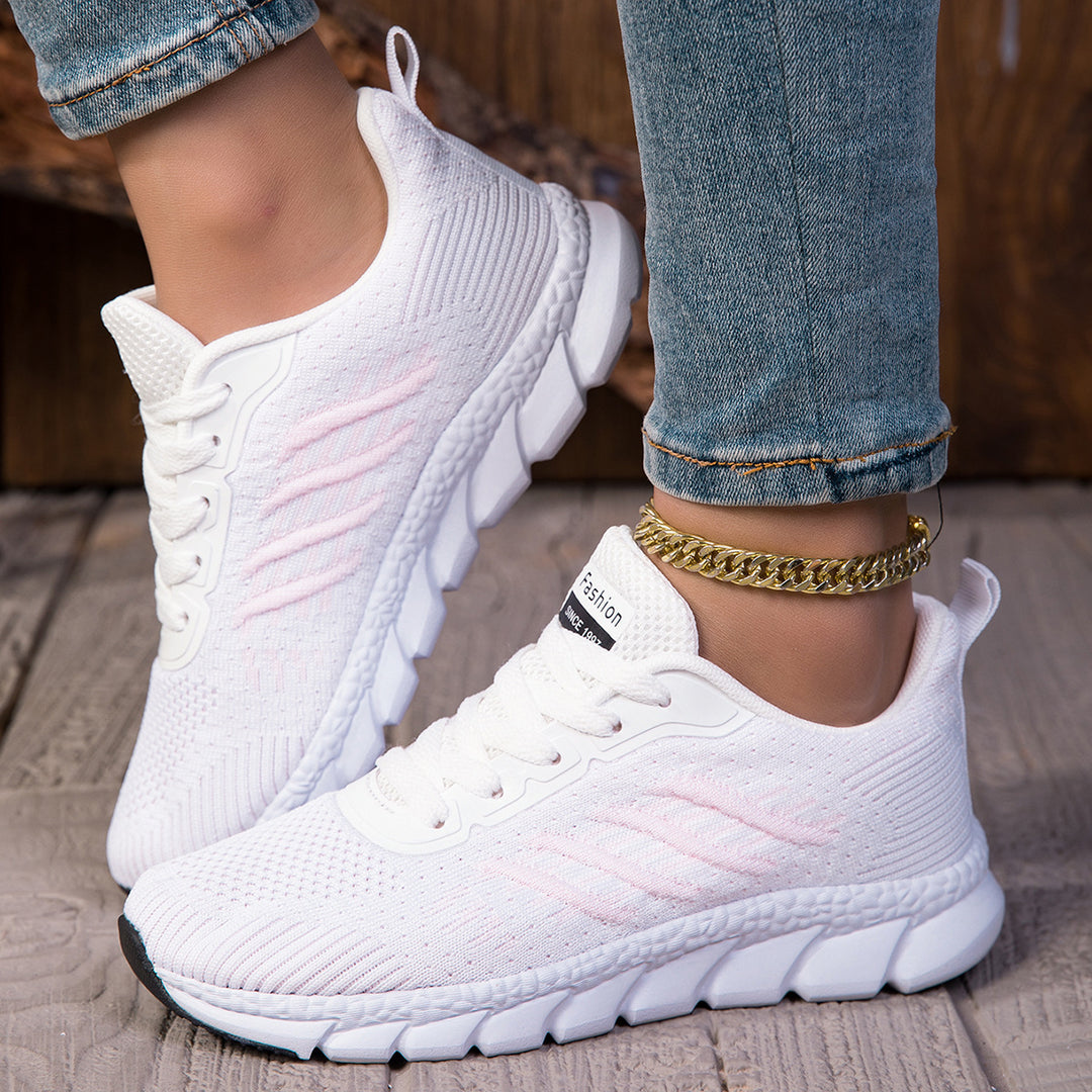 Women's knitted slip-on sneakers with elastic shaft, decorative lacing, and segmented cushioning sole Mune Fashion
