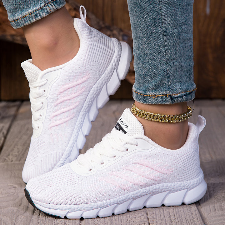 Women's knitted slip-on sneakers with elastic shaft, decorative lacing, and segmented cushioning sole Mune Fashion
